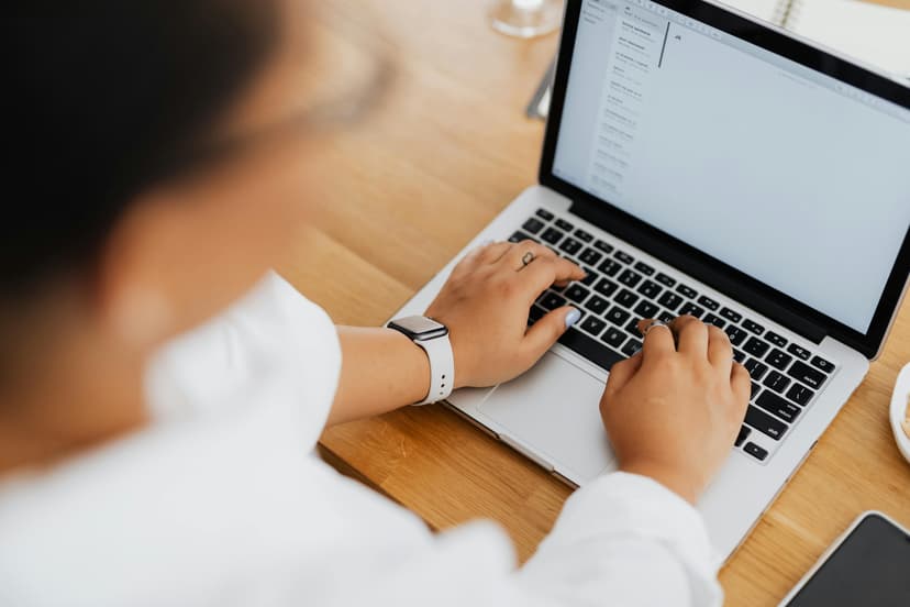 Person typing on laptop